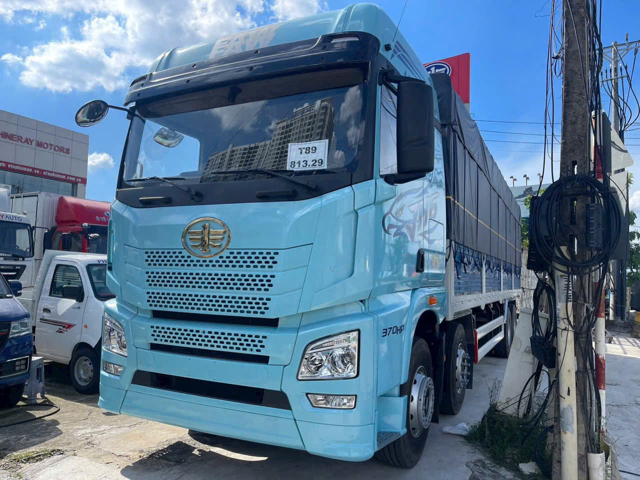 So sánh xe tải thùng 4 chân FAW JH6 và Howo